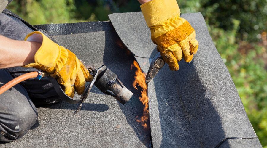 Professional gutter cleaning in Clarence, MO